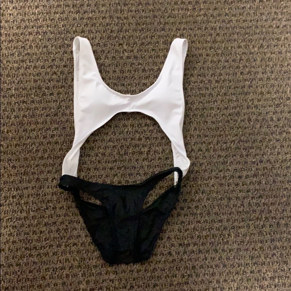 NEVER BEEN WORN One piece cheeky swimsuit